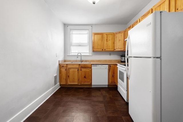 622 Bellaire Ave, Brookline, PA 15226 - kitchen with white appliances, a sink, light countertops, and baseboards
