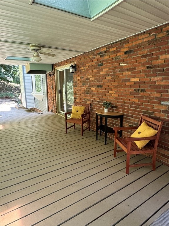 wooden terrace with ceiling fan