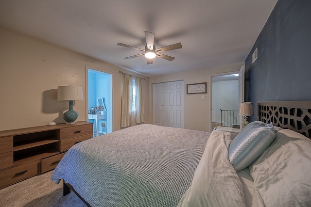 bedroom with carpet flooring, ceiling fan, and a closet