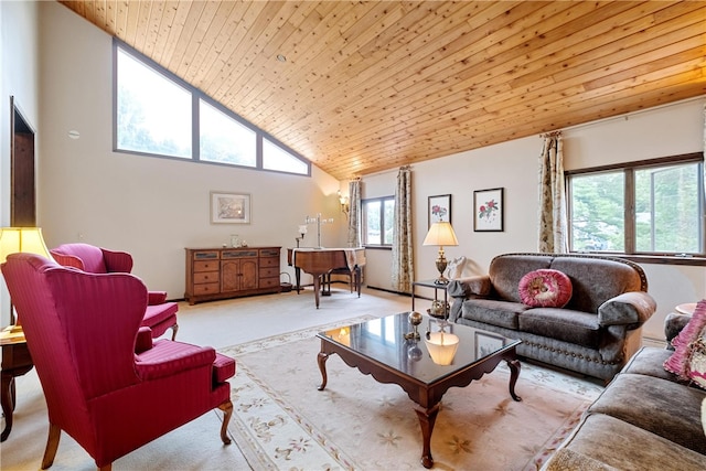 living room featuring high vaulted ceiling, a wealth of natural light, and light carpet