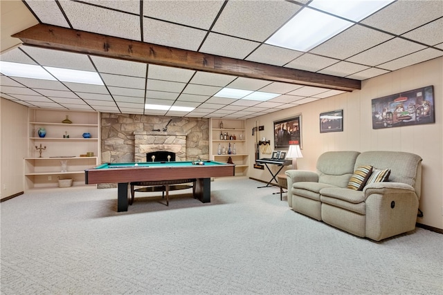 recreation room featuring carpet, a paneled ceiling, pool table, and a stone fireplace