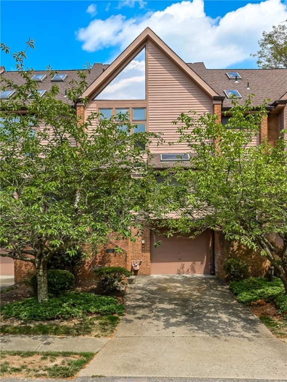 view of front of property featuring a garage