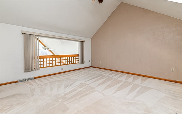 bonus room featuring light carpet, lofted ceiling, and ceiling fan