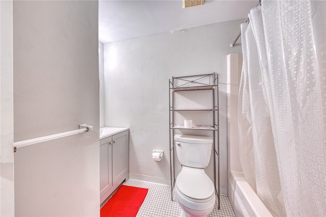 full bathroom featuring shower / bath combination with curtain, tile patterned flooring, toilet, and vanity