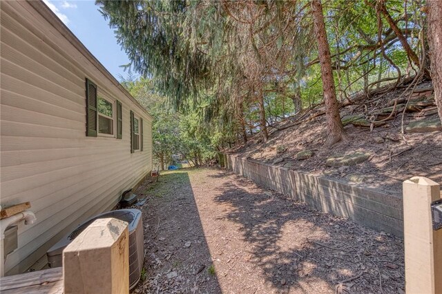 view of yard featuring central AC unit