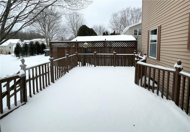 view of snow covered deck