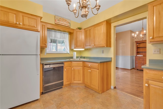 kitchen featuring white fridge, a chandelier, light hardwood / wood-style flooring, dishwasher, and sink