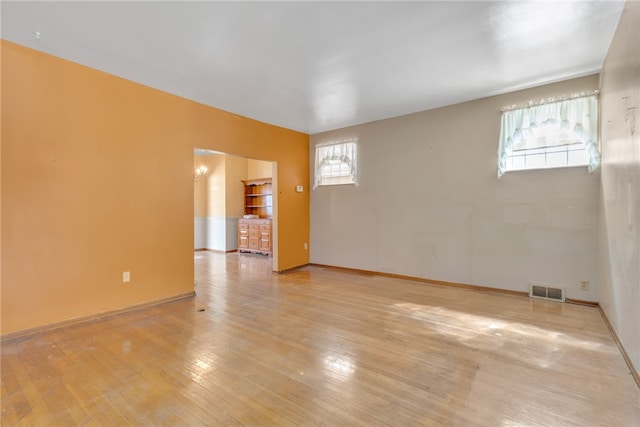 empty room with light wood-type flooring