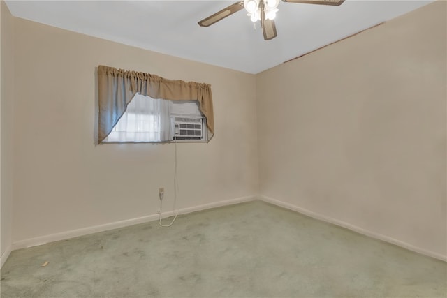 unfurnished room with ceiling fan and carpet flooring