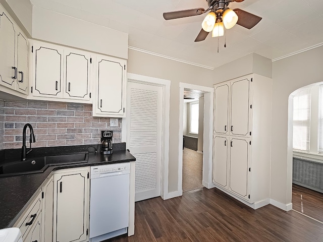 kitchen with dishwasher, sink, ceiling fan, dark wood-type flooring, and white cabinets