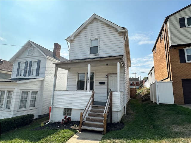 front facade with a front lawn