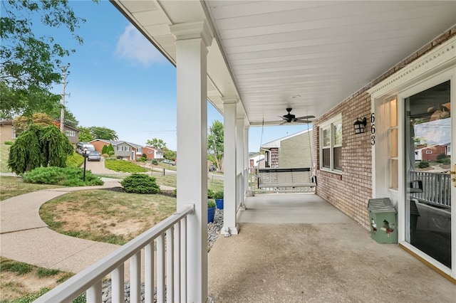 view of patio featuring ceiling fan and covered porch