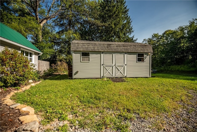 exterior space featuring a storage shed