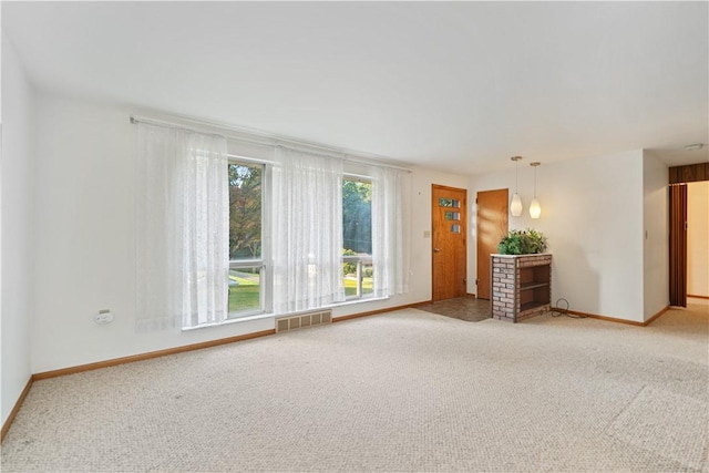 empty room with carpet flooring