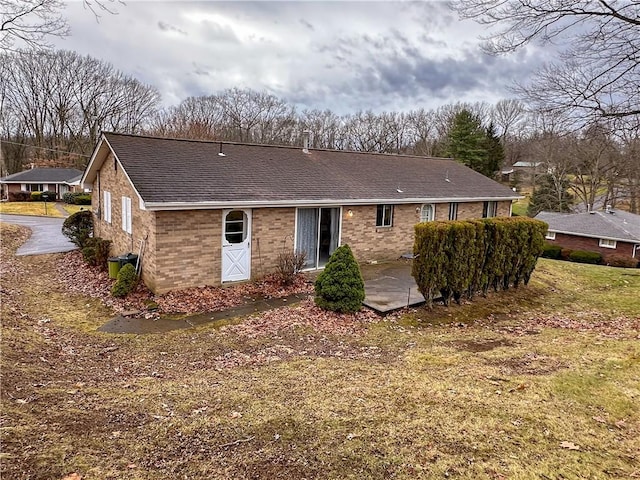 back of property with a patio area