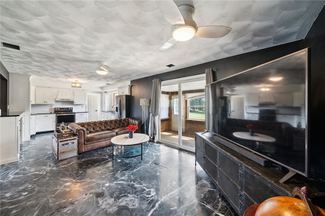 living room featuring ceiling fan