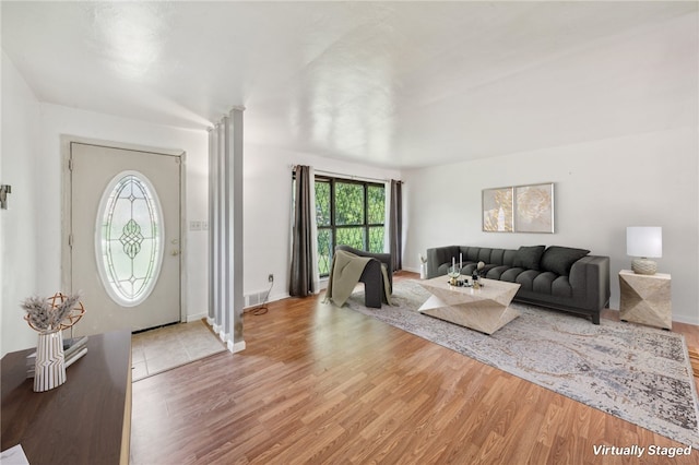 entrance foyer with light hardwood / wood-style floors