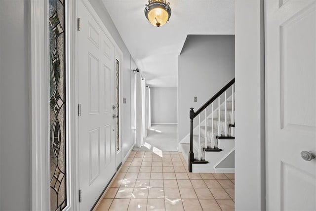 view of tiled foyer entrance