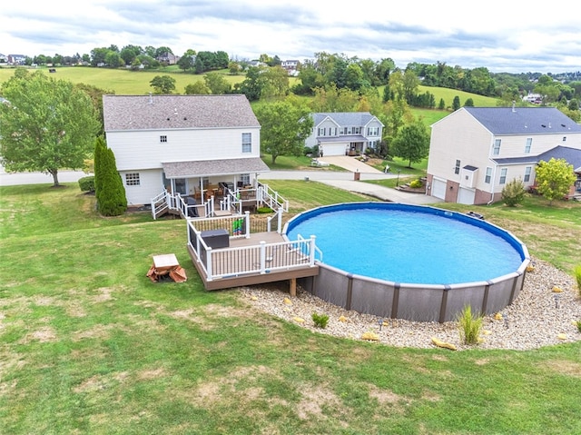 view of pool featuring a wooden deck