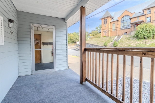 balcony featuring covered porch