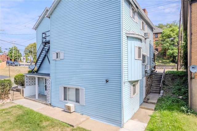4900 Walnut St, Versailles Boro, PA 15132 - view of side of home with stairs
