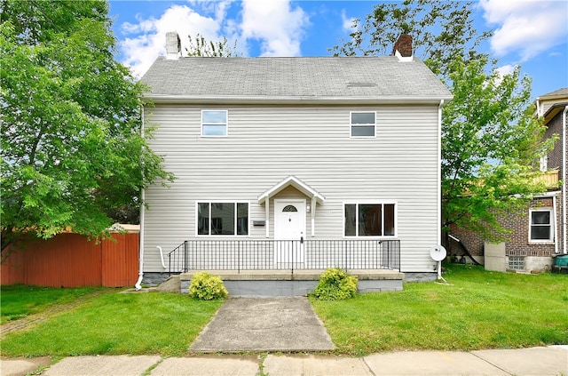 view of front of home with a front lawn