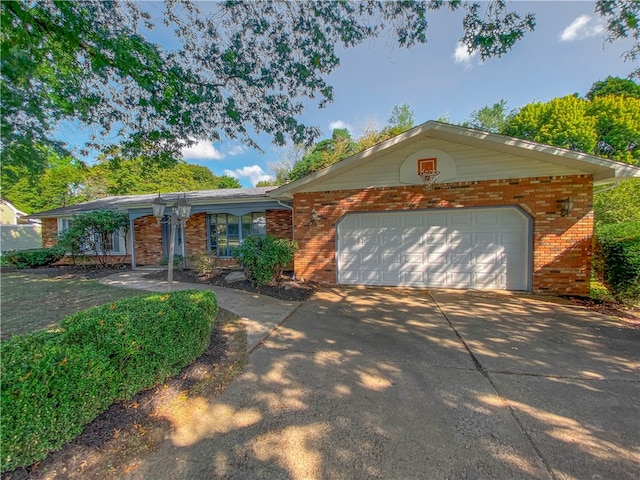 ranch-style home featuring a garage