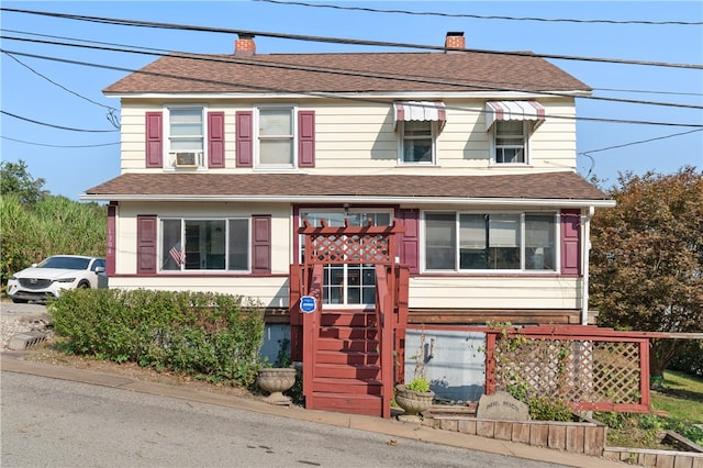 view of front of property featuring cooling unit