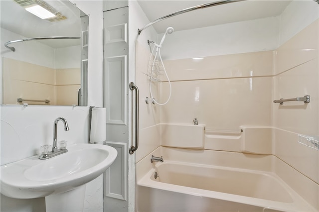 bathroom with  shower combination and sink