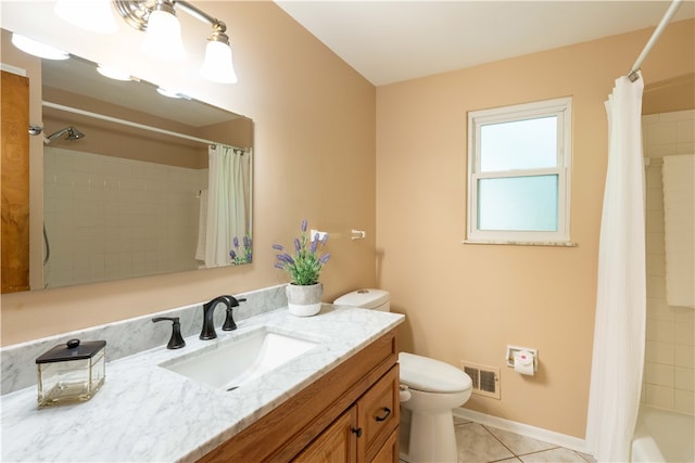 full bathroom featuring vanity, shower / tub combo, tile patterned floors, and toilet