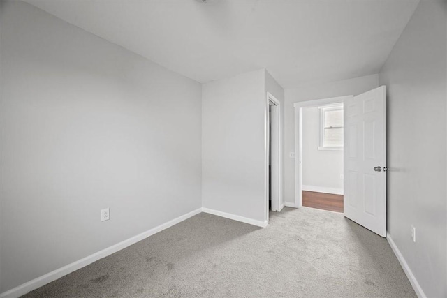 932 Gaskill Ave, Jeannette, PA 15644 - unfurnished bedroom with carpet and baseboards