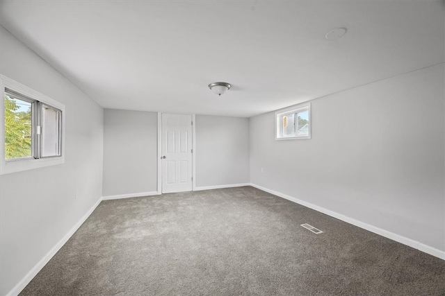 empty room featuring carpet flooring