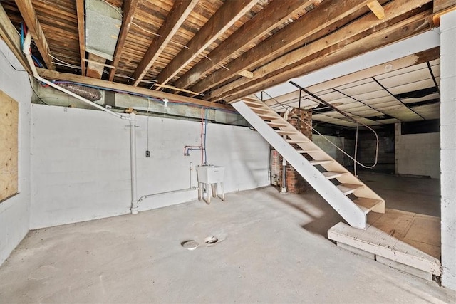 932 Gaskill Ave, Jeannette, PA 15644 - unfinished basement featuring stairway and a sink