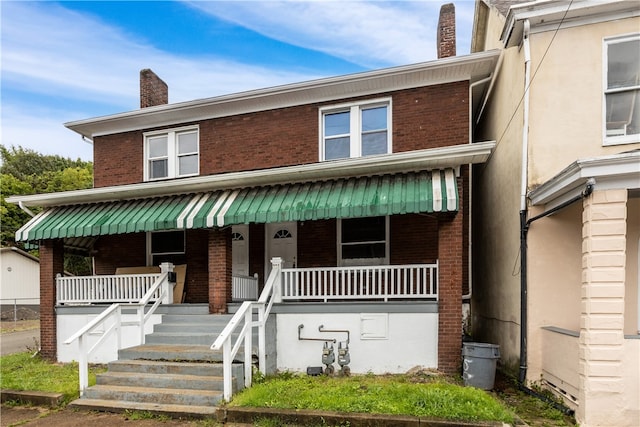 multi unit property featuring covered porch