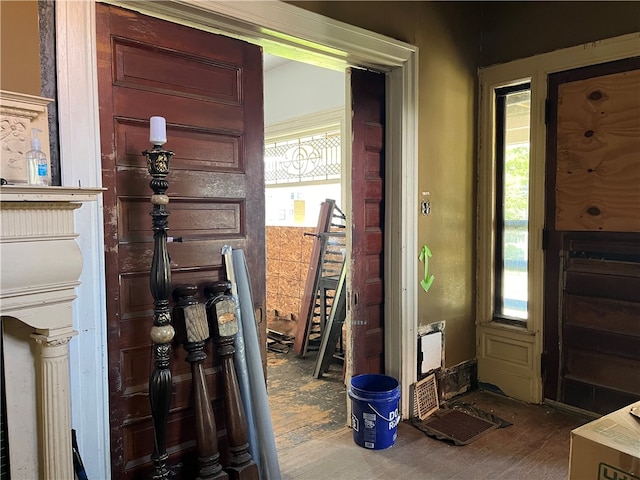 entryway with hardwood / wood-style flooring