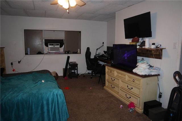 bedroom featuring cooling unit, ceiling fan, and carpet floors