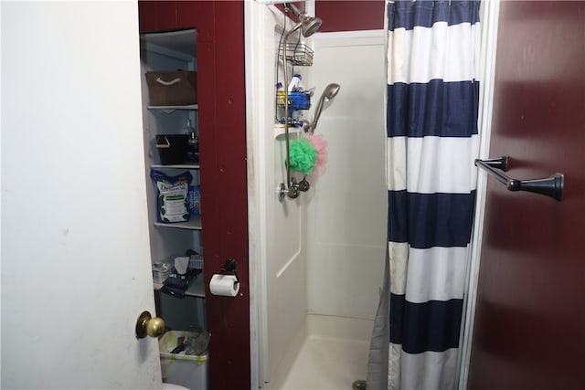 bathroom with a shower with shower curtain