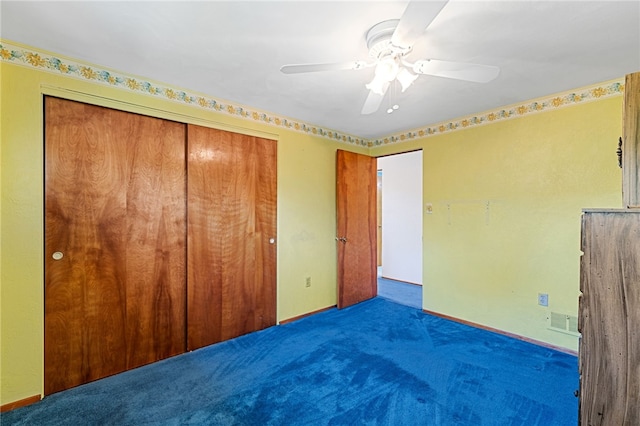 unfurnished bedroom featuring a closet, ceiling fan, and carpet floors