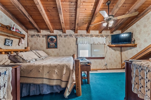 unfurnished bedroom with wooden ceiling, lofted ceiling with beams, ceiling fan, and carpet flooring