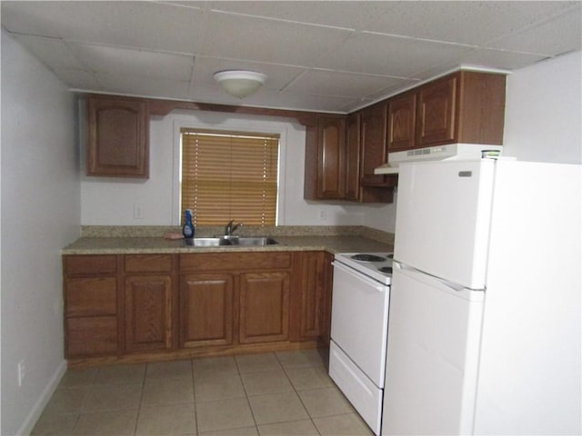 203 W George, Carmichaels/Cumblnd, PA 15320 - kitchen featuring white appliances, a sink, brown cabinets, and a drop ceiling
