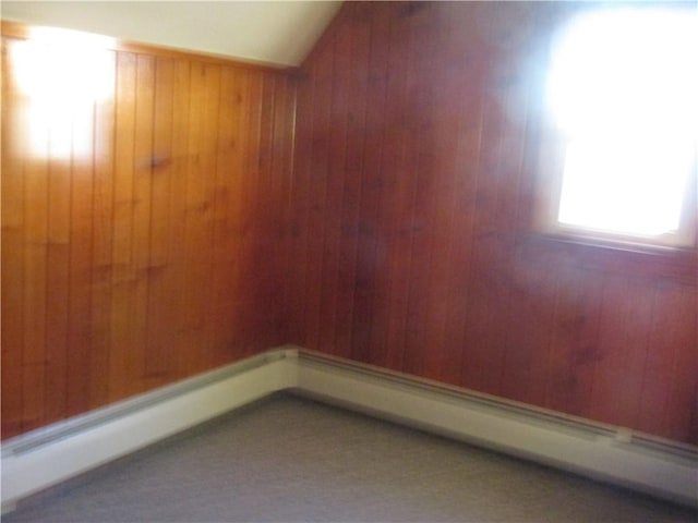 203 W George, Carmichaels/Cumblnd, PA 15320 - spare room featuring baseboard heating, wooden walls, and vaulted ceiling