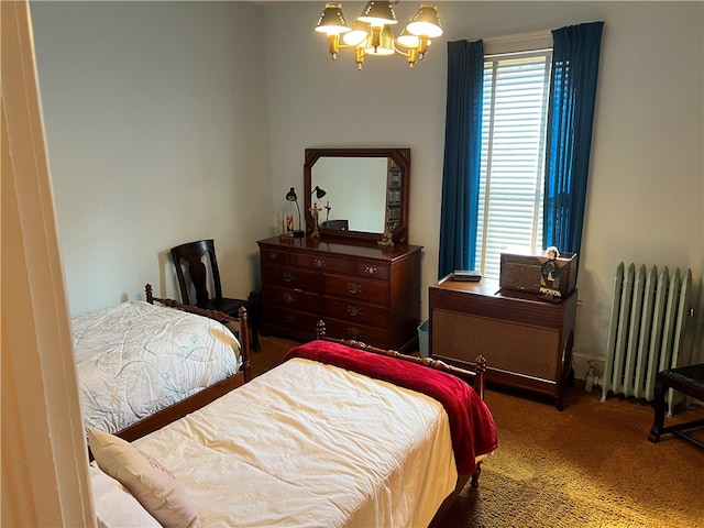 bedroom with radiator heating unit, a chandelier, and carpet