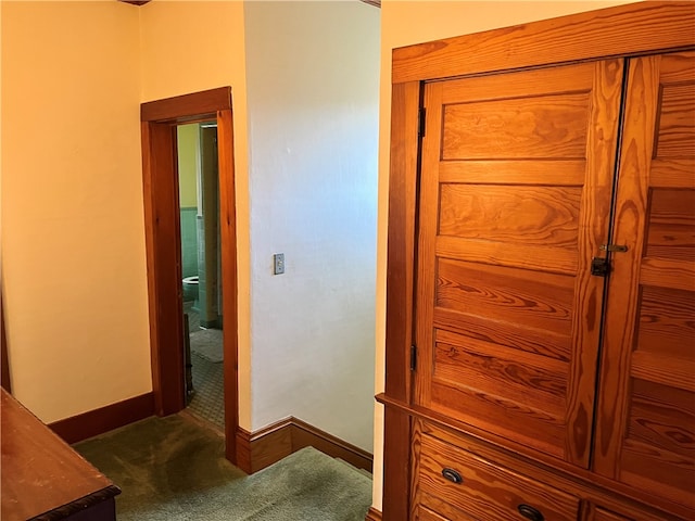 hallway featuring carpet floors