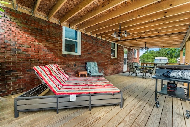 wooden deck with ceiling fan