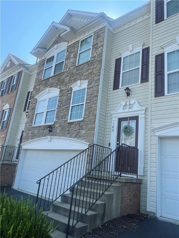 view of front of home with a garage