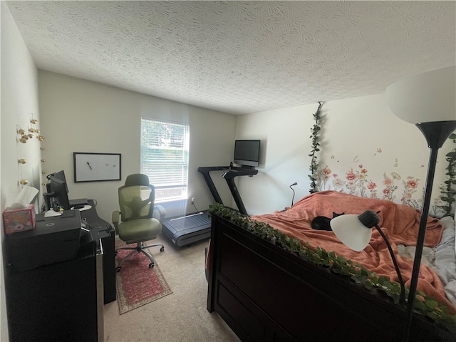 carpeted bedroom with a textured ceiling