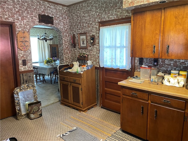 kitchen with a chandelier