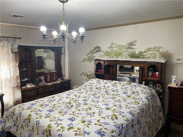 bedroom with ornamental molding, wooden walls, a chandelier, and a textured ceiling