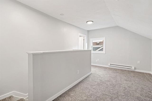 bonus room featuring lofted ceiling, baseboard heating, and carpet flooring