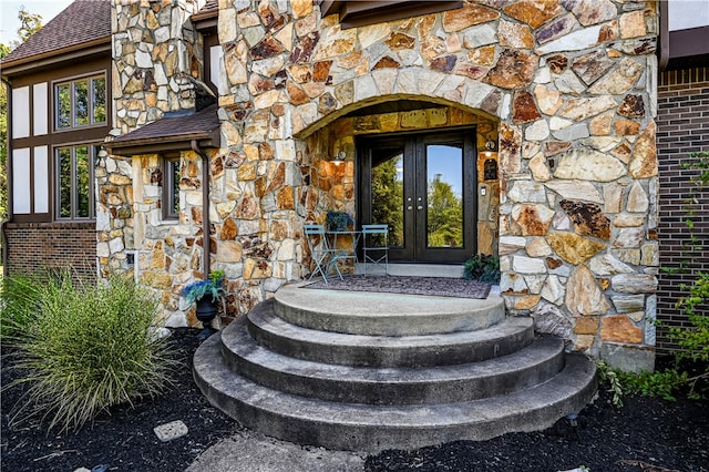 entrance to property featuring french doors